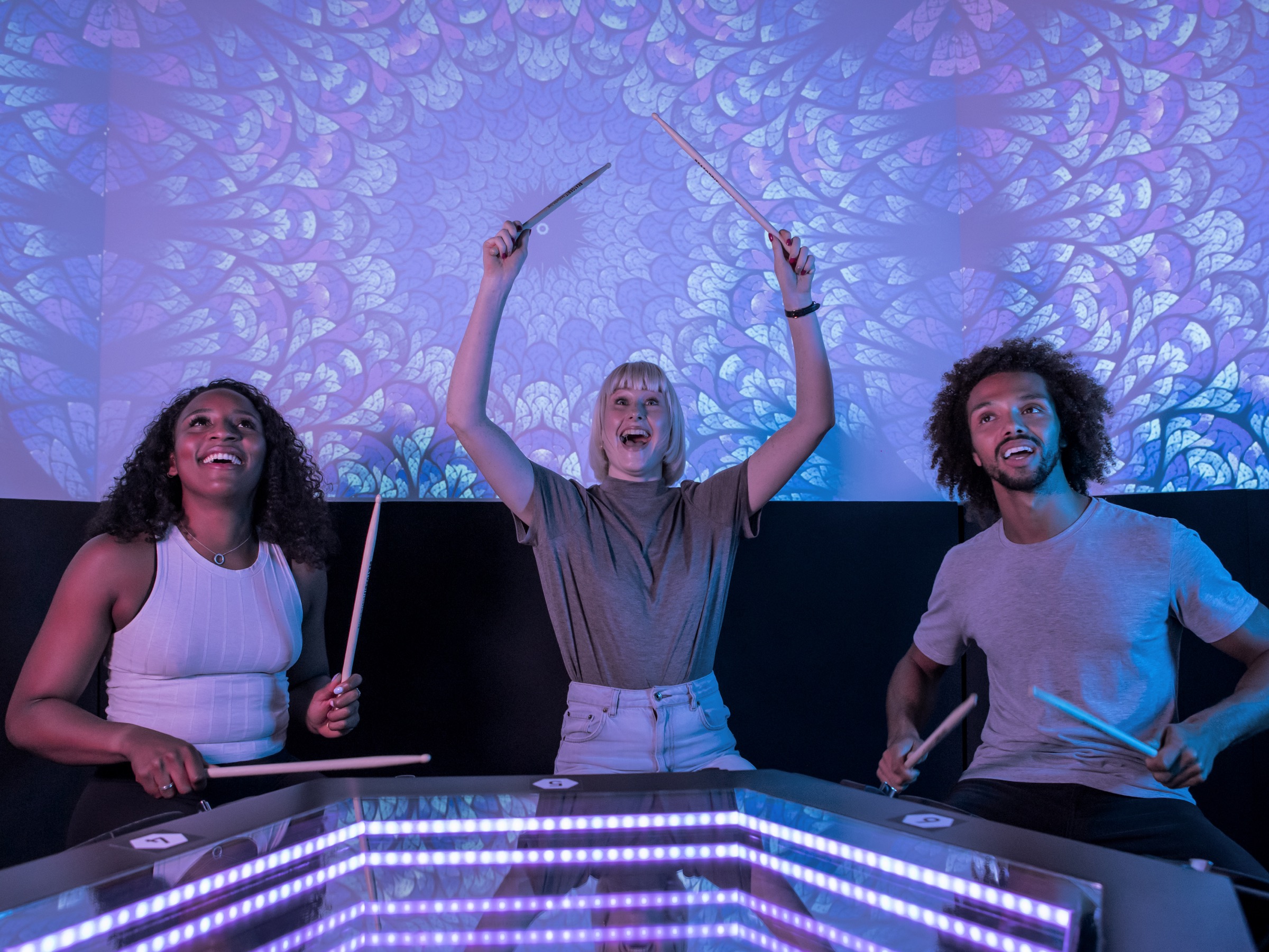 A group celebrating during a BeatOrbit session